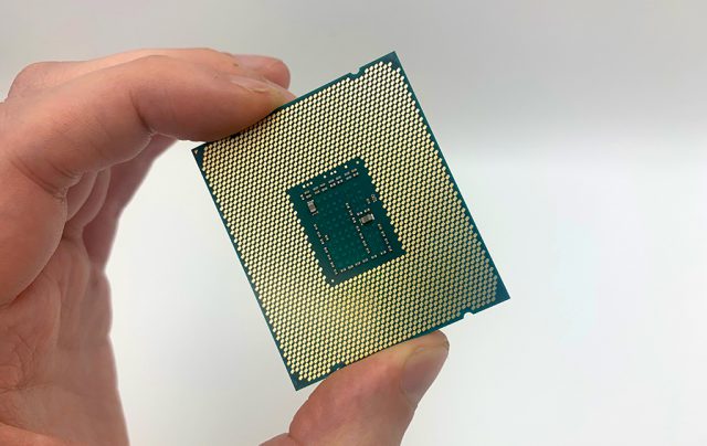 Hand holding a CPU processor that we sell cheap in good quantities and high quality